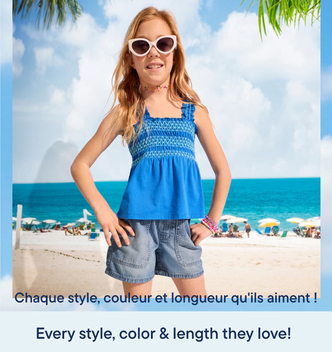 Une jeune fille souriante, lunettes de soleil et tenue d'été sur le nez, se tient sur une plage sous un ciel bleu parsemé de nuages. Un texte annonce une réduction de 60 % sur les shorts, avec livraison gratuite grâce au code SHIPSHORTS.