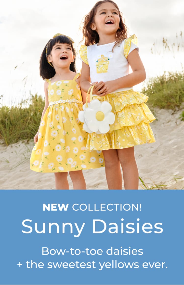 Bow-to-toe daisies + the sweetest yellows ever.