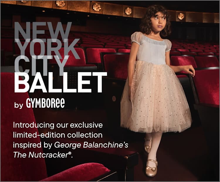The image shows a young woman wearing a light-colored dress standing in a theater setting with red seats and stage curtains in the background.