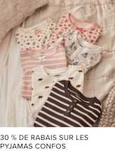 Une collection de pyjamas confortables et à motifs, aux couleurs et motifs variés, notamment à rayures et à pois, disposés sur un fond beige doux.
