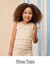 A collection of children's clothing items, including a navy blue patterned jacket, a beige hooded sweater, a striped shirt, and a pair of light-colored pants, all displayed against a plain white background with the text "up to 40% Off Shop Driftwood Bay" overlaid.