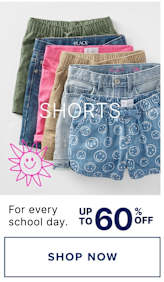 The image displays a variety of colorful and patterned shorts, including olive green, pink, and denim-colored options, along with a sun icon and the text "For every school day. $5 & up. SHOP NOW."