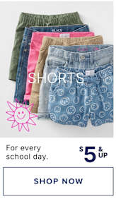 The image displays a variety of colorful and patterned shorts, including olive green, pink, and denim-colored options, along with a sun icon and the text "For every school day. $5 & up. SHOP NOW."