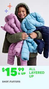 A person wearing a colorful, layered puffer jacket is smiling and embracing themselves, with a price tag of $15.99 and up displayed prominently in the foreground.