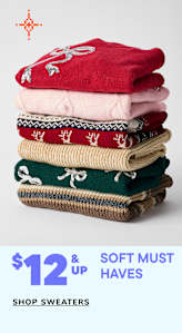 A stack of colorful, patterned sweaters with a price tag indicating a sale on soft must-have items.
