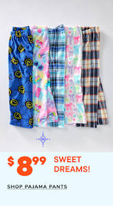 A collection of colorful and patterned pajama pants, including designs with smiley faces, flowers, and plaid, are displayed on a white background with a price tag of $8.99 for "Sweet Dreams!" pajama pants.