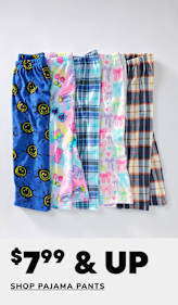 A collection of colorful and patterned pajama pants, including designs with smiley faces, floral prints, and plaid, arranged on a plain background with a "60% off" sale sign.