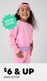 A young girl with curly hair wearing a pink outfit and holding a green sign that says "SNOW CUTE!" is smiling brightly against a plain white background, with a 60% off sale promotion displayed below.