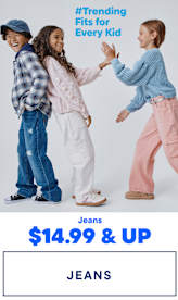 The image features three young girls wearing trendy casual outfits, including jeans, and interacting with each other in a playful manner against a plain background with a "#Trending Fits for Every Kid" text overlay.