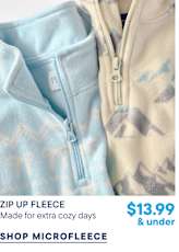 Two fleece quarter-zip pullovers, one light blue and one cream with a mountain print, are displayed against a plain white background.