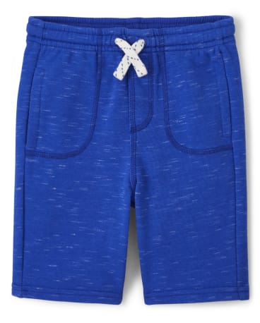 Boys Pull On Shorts - Music Festival
