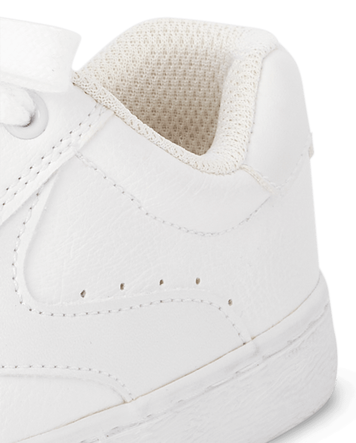 Baskets basses uniformes pour garçon