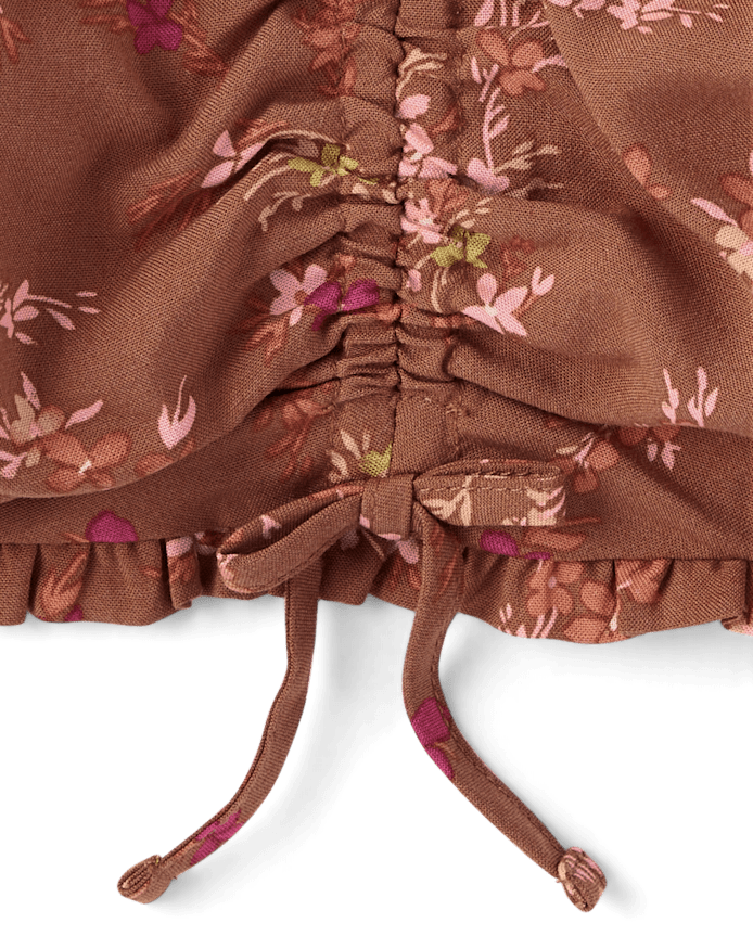 Haut fleuri cintré sur le devant pour fille