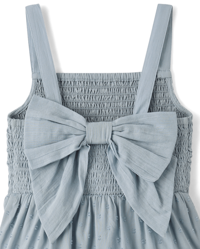 Robe à pois texturée pour fille avec nœud dans le dos