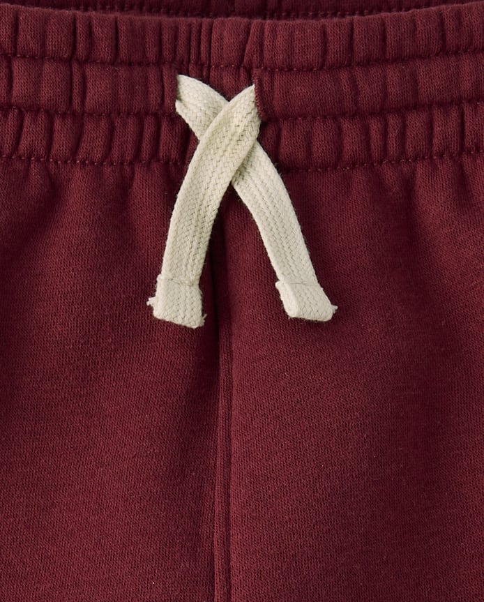 Pantalon de survêtement en polaire premium à motif graphique pour garçon