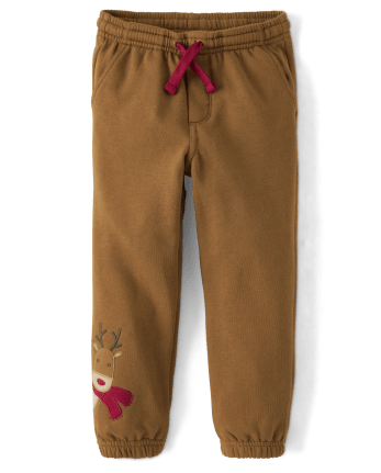 Pantalones jogger de forro polar con renos bordados para niños - Cabina de Navidad