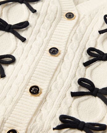 Gilet en maille torsadée à nœud papillon pour fille - Petit Paris