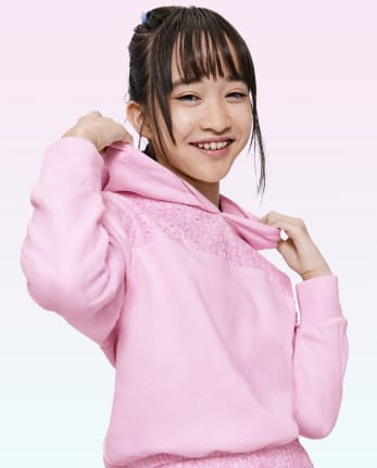 Sudadera con ojal