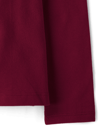 Polo en piqué d'uniforme à volants pour fille - RUBINE