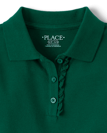 Polo en piqué d'uniforme à volants pour fille