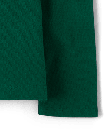 Polo en piqué d'uniforme à volants pour fille