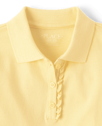 Polo de piqué con volantes de uniforme para niñas