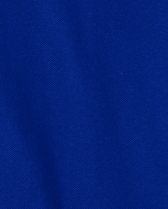 Polo de piqué con volantes de uniforme para niñas - RENEW BLUE