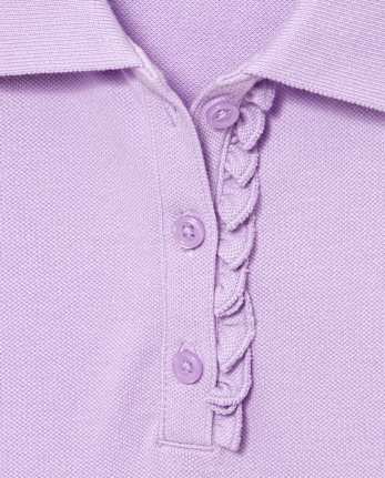 Polo de piqué con volantes de uniforme para niñas