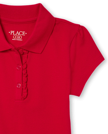 Polo de piqué con volantes de uniforme para niñas