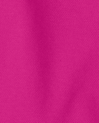 Polo de piqué con volantes de uniforme para niñas