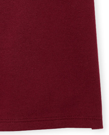 Polo d'uniforme en piqué à volants pour toute-petite fille