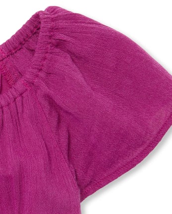 Mameluco tejido con cinturón y bordado para niñas