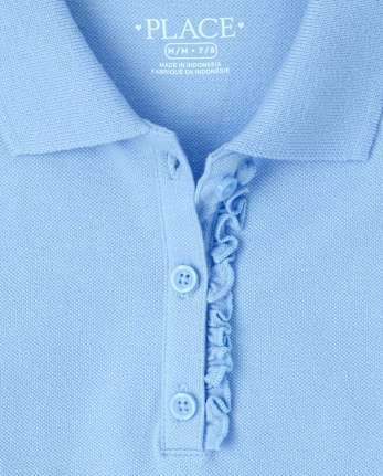 Polo de piqué con volantes de uniforme para niñas
