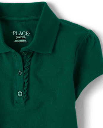 Polo de piqué con volantes de uniforme para niñas