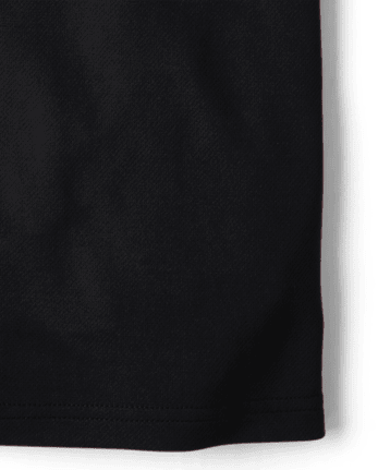 Polo de rendimiento de uniforme para niños