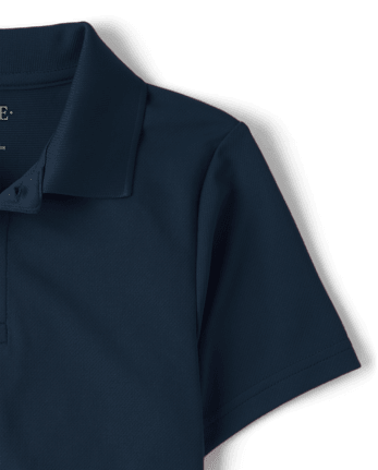 Polo de performance uniforme pour garçon
