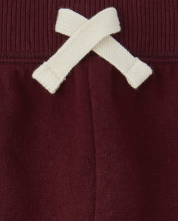 Pantalones deportivos de polar a rayas activos para bebés y niños pequeños