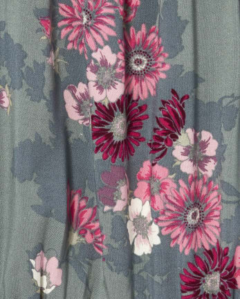 Mameluco con volante floral para niñas