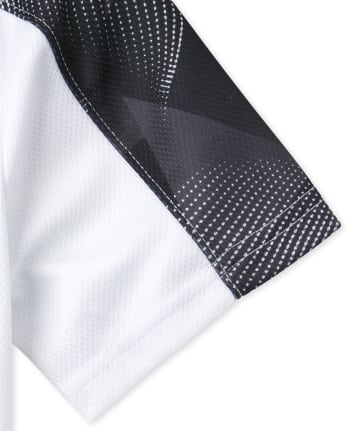 Haut de performance en maille Mix and Match pour garçon
