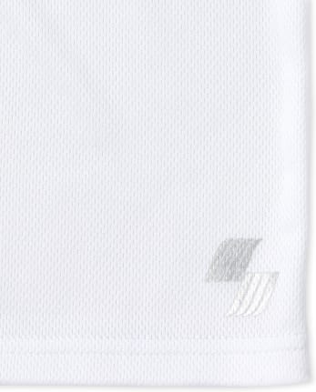 Haut de performance en maille Mix and Match pour garçon
