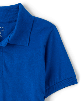 Polo de uniforme para niños