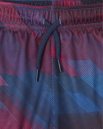 Shorts de baloncesto de alto rendimiento de malla para niño