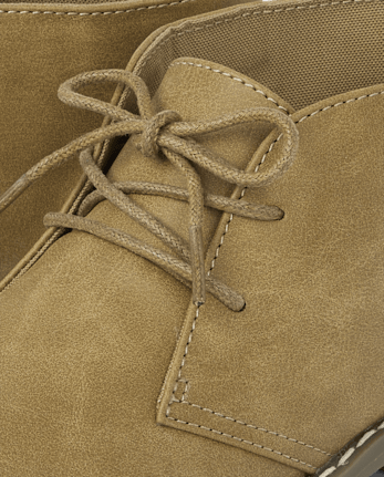 Botas con cordones para niños