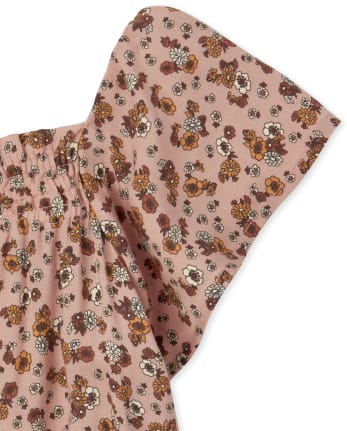 Mameluco con volante floral para niñas