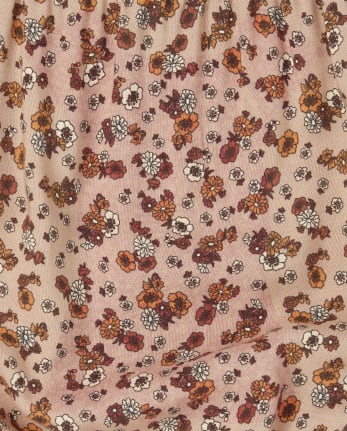 Mameluco con volante floral para niñas