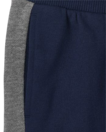 Pantalones jogger de vellón con rayas laterales para niños