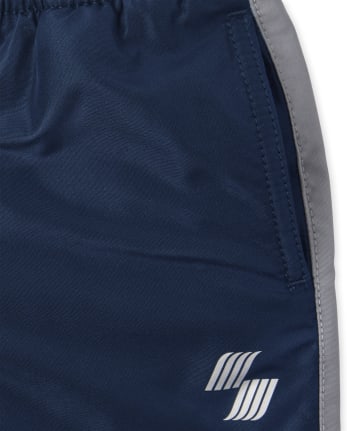 Pantalon coupe-vent à rayures latérales pour bébés et tout-petits garçons