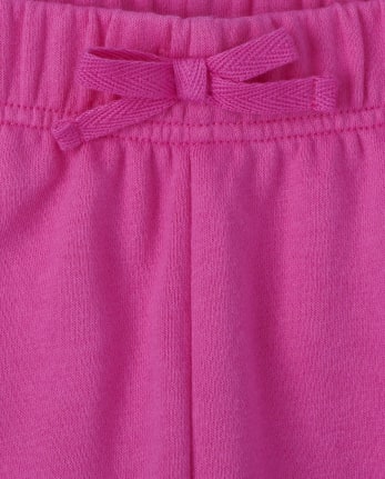 Pantalones jogger de forro polar con corazones arcoíris para niñas