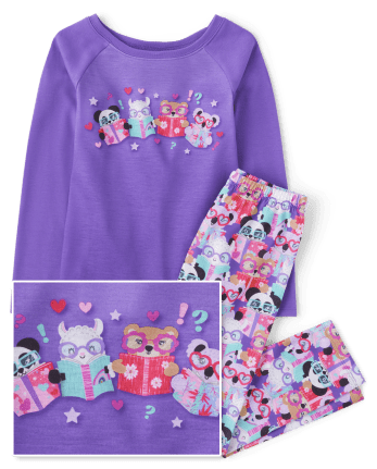Pijamas de animales leyendo para niñas