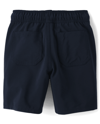 Shorts deportivos sin cierres de secado rápido para niños